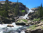 Looking back east to Tuolumne Falls from downstream. A videographer is setting up on a spot where I'd just stood.