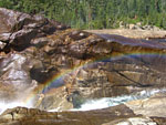 Mini-rainbow in the channel below Waterwheel
