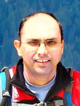 Manoj Kumar, 40, atop Halfdome June 13, 2009 by friend Yogi, enhanced by L. Sullivan.