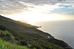 After circumnavigating the northwest end of the island and descending to Starlight Beach - the end of the trail - I climb back up to the south as the sun sinks into the western sea