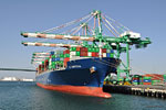 Arriving back at San Pedro, a deckhand explains these giant freighters arrive full from China, and often return empty.