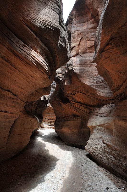 (opens in new window) As clouds move across the sky, light and shadows flicker through the caverns.